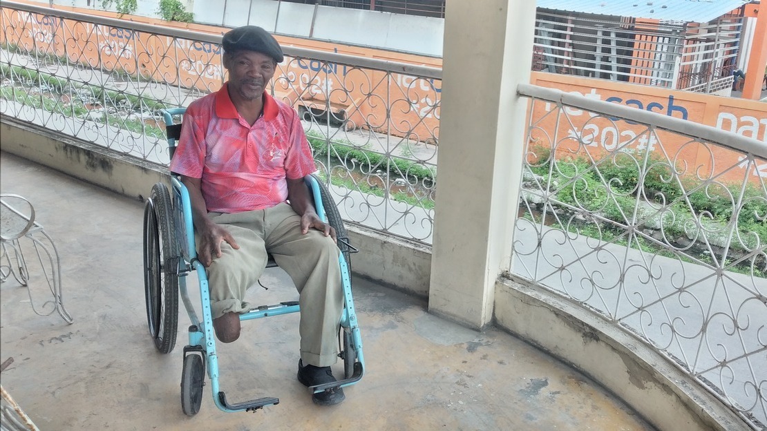 Jean Mario, an earthquake survivor, receives support from HI